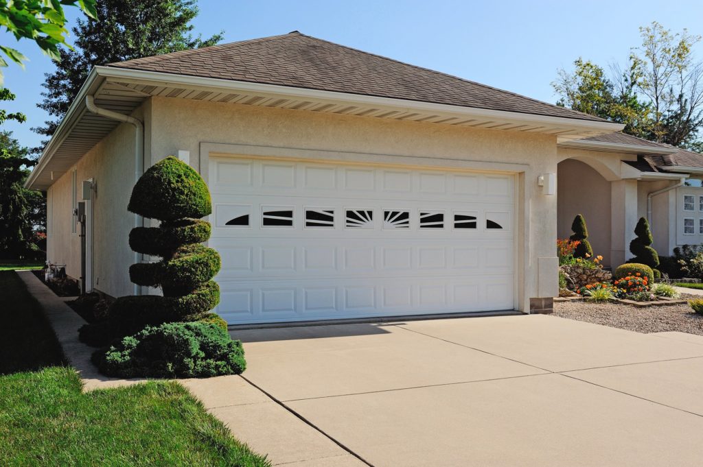 Short Raised Panel shown in White with optional 8 Piece Sunburst window inserts.