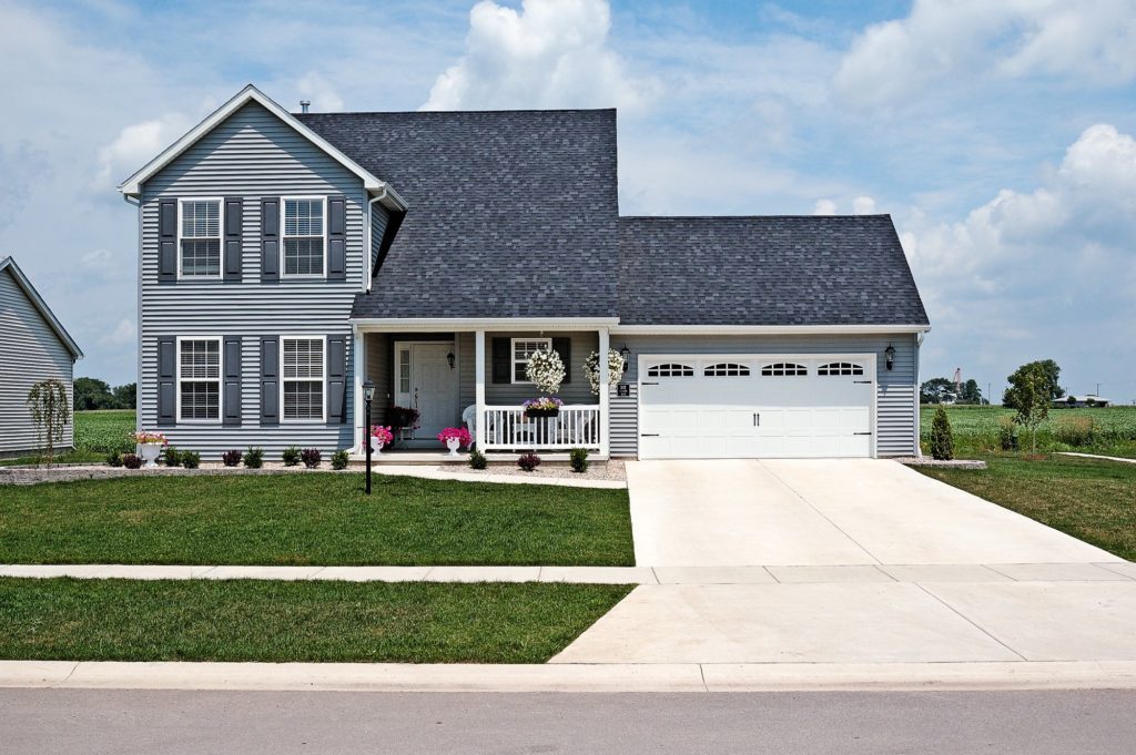 Stamped Carriage House Short shown in White with optional Cascade widow inserts and Spade hardware