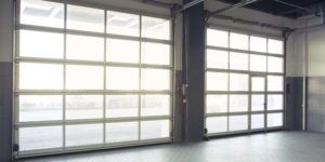 Empty Interior Auto Garage Door— garage door services in Katy TX