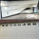 garage door replacement of crushed garage door to new metal garage door with windows