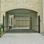 decorative garage gate with iron bars