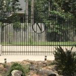 decorative driveway gate with engraved N