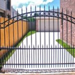 residential driveway gat with iron bars